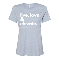 Thumbnail for Embrace positivity and style with the 'Live, Love & Elevate' women’s relaxed fit t-shirt. Made from soft, breathable fabric, this shirt offers both comfort and flair with a flattering, relaxed silhouette. Whether you're out with friends or enjoying a casual day, the inspirational message encourages you to live your best life and elevate your mood. Perfect for pairing with jeans, leggings, or shorts, this versatile tee adds a touch of motivation and style to any wardrobe.